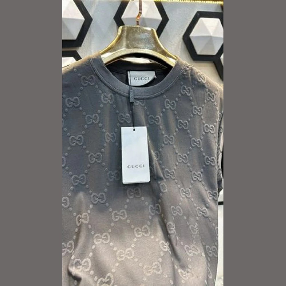 HOME | KOSMICKS | ONLINE BRAND STORE | 2026 112 GC LOGO EMBOSSED PREMIUM GREY TSHIRT To Process your Order Faster WhatsApp your Order ID at +91 87795 16010 For faster delivery prefer online payment Order : Whatsapp us at +91 87795 16010 to Confirm the Availability.